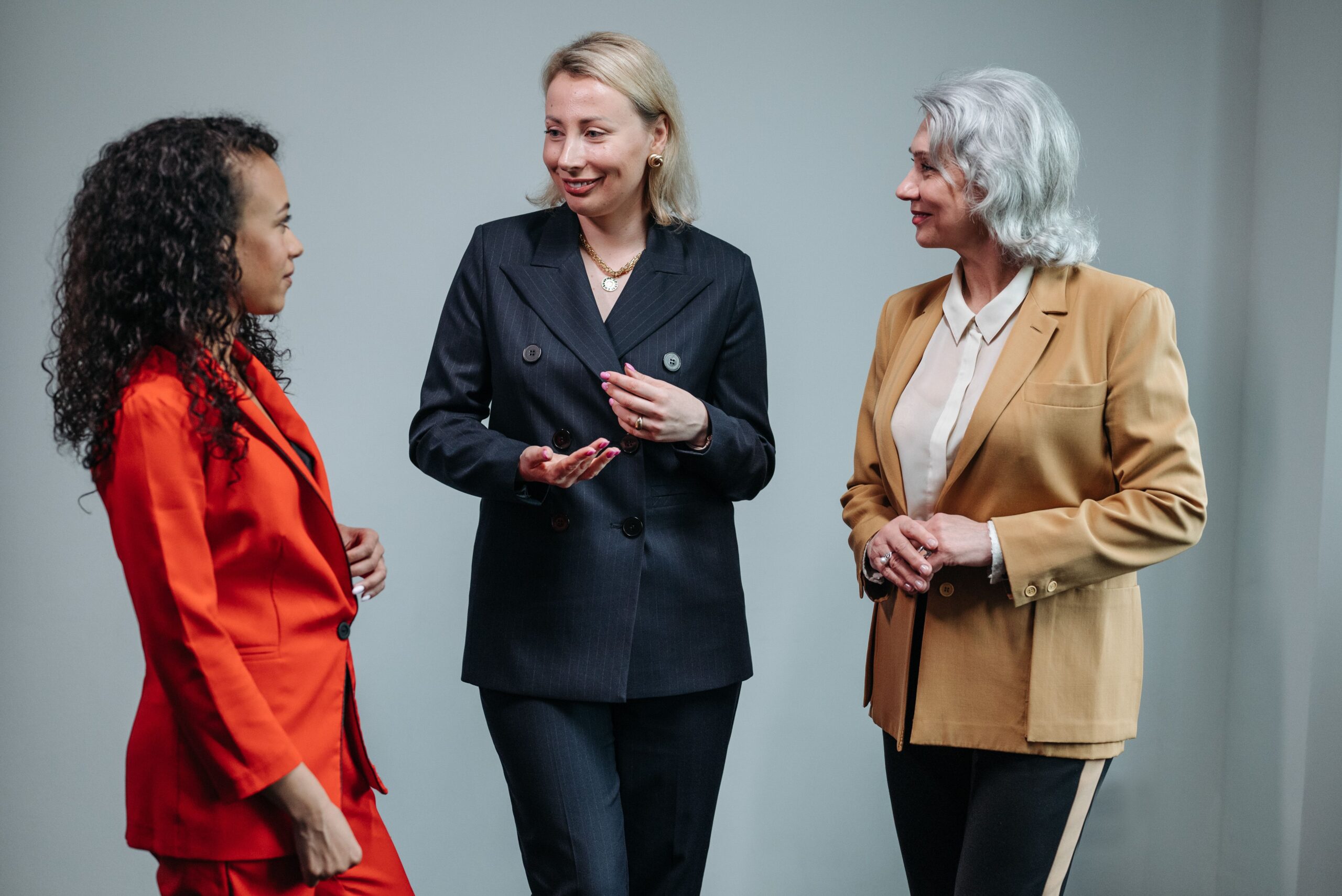 Three women talking.